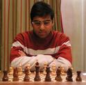 Anand begins world chess title defence with a draw 