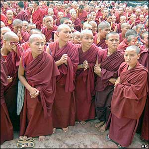 Buddhist monks begin praying