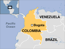 Two injured, six trucks burned in rebel attack in Colombia 
