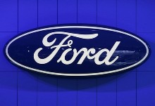 Ford cuts debt 38 per cent