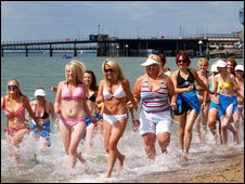 Weather forecast spoils UK bid to set new world record of most women in bikinis!